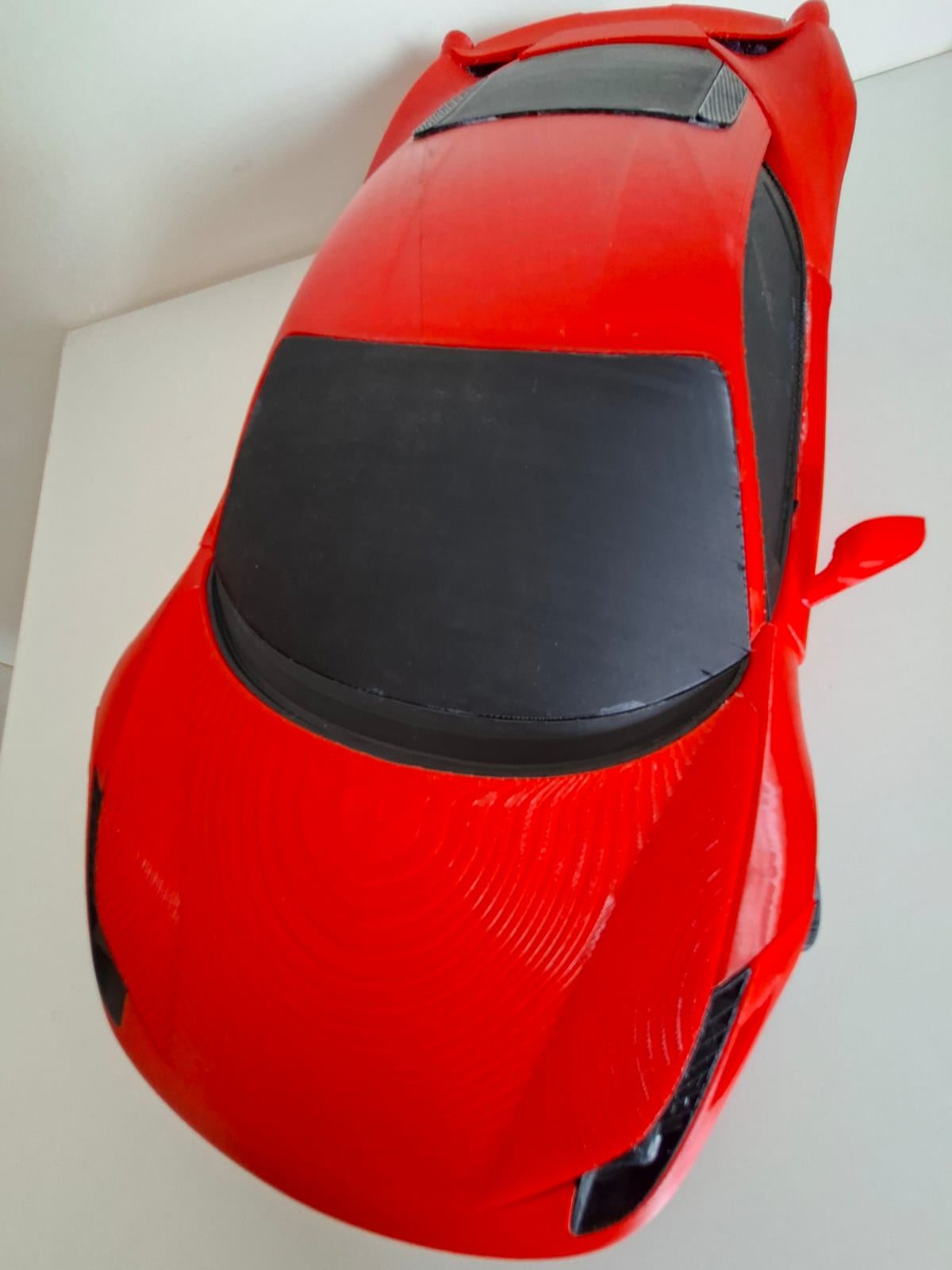 A 3D-printed sports car model built by a student